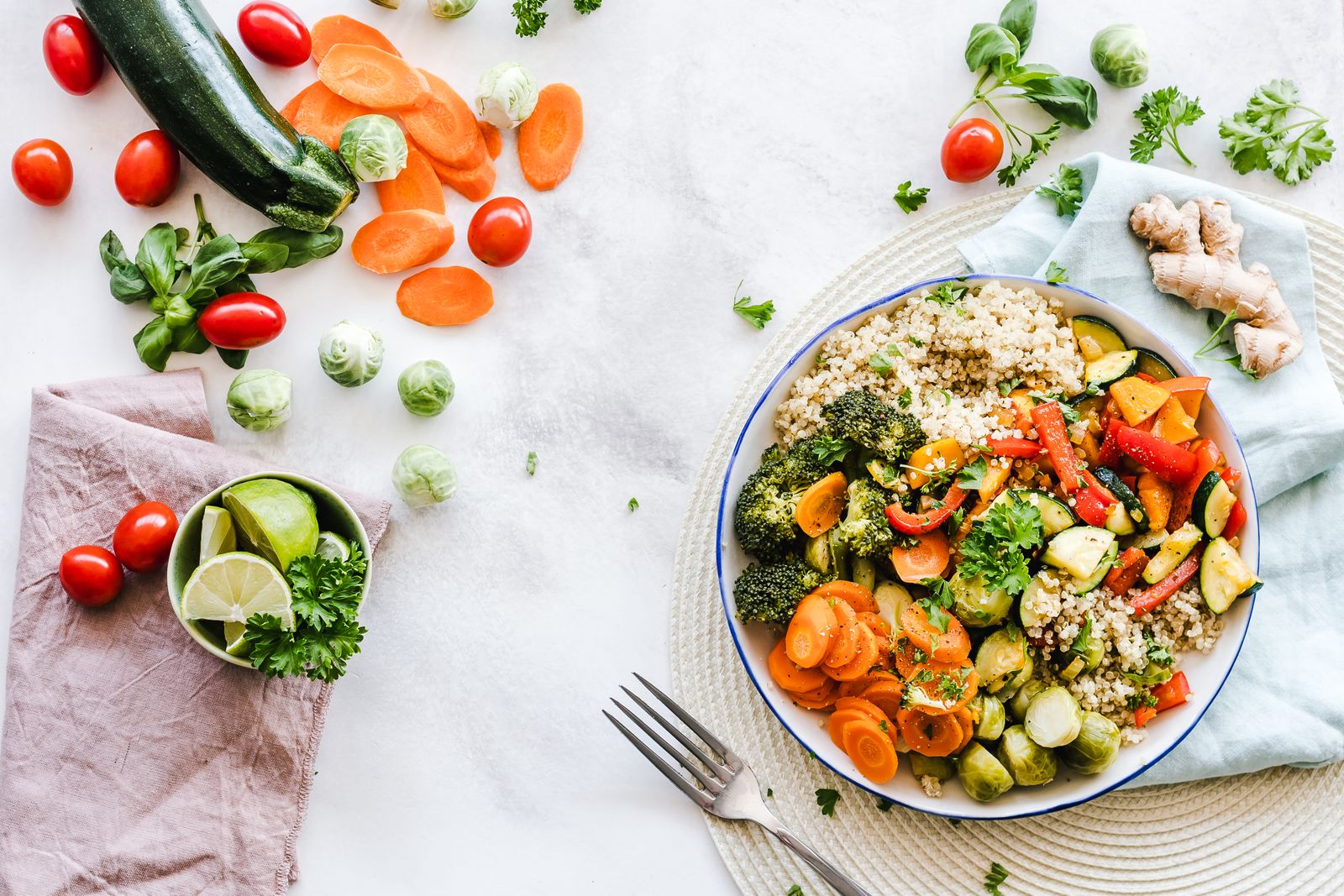 Bowl of vegetables, grains, and fresh produce representing a balanced pregnancy diet
